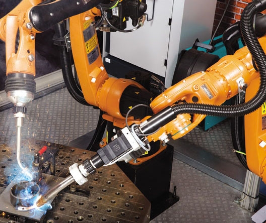 Double station robot welding